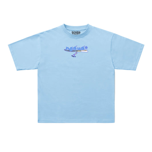 A light blue short-sleeve t-shirt with a small graphic of a blue and purple airplane on the chest, displayed flat against a light gray background.