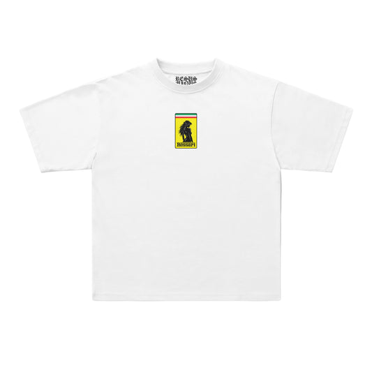A white short-sleeve crewneck t-shirt with a small graphic on the left chest depicting a black dog silhouette against yellow, green, and red stripes, with 'BEACHWEAR' printed inside the collar.
