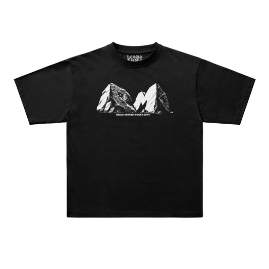 A black short-sleeve t-shirt with a white graphic of two mountain peaks and the text 'RESUS STONED WORKS DEPT' printed on the chest, displayed flat against a light gray background.